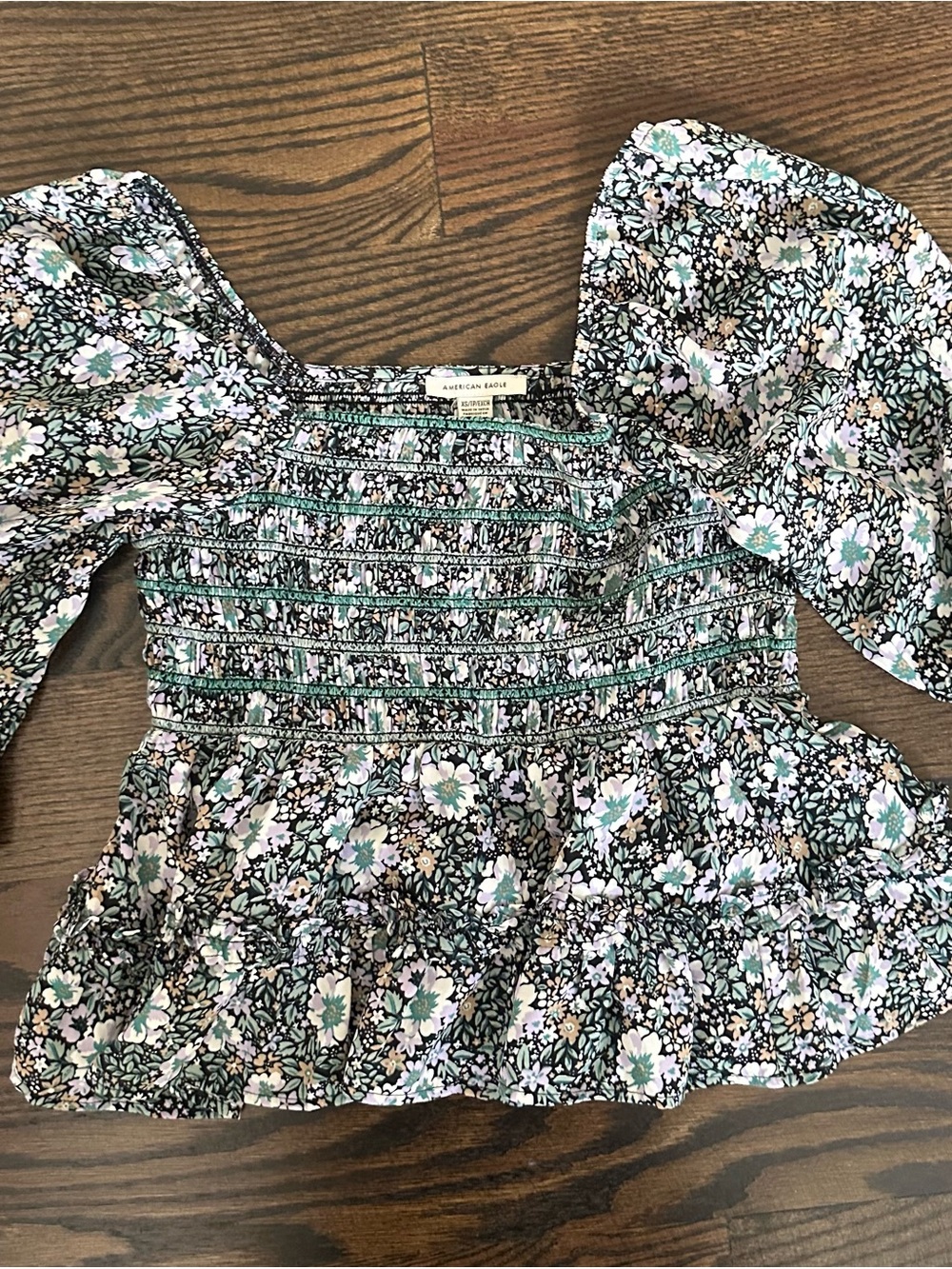 American Eagle Outfitters Black Floral Smocked Peplum Top with Green Accents